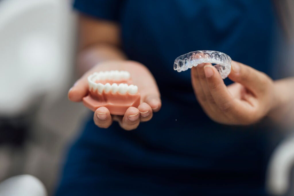 What Are Retainers? Understanding Their Use, How They Work, and Differences from Aligners